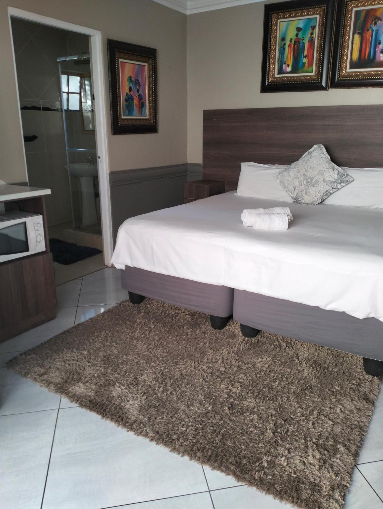 Sunrise Boutique Hotel Witbank Bagian luar foto
